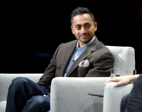 Chamath Palihapitiya poses a picture in a brown suit.